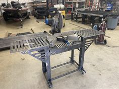 a metal work bench in a garage with tools on it