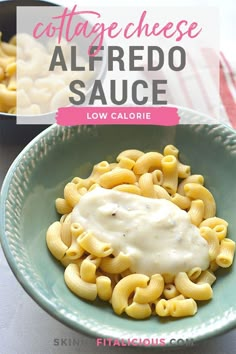 a bowl filled with pasta and sauce on top of a table