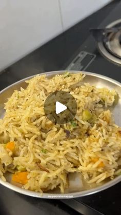 a pan filled with food sitting on top of a stove