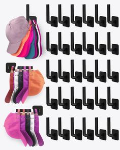 there are many pairs of socks hanging on the wall and one has a hat in it