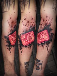 three tattoos on the legs of people with red and black ink that says club up