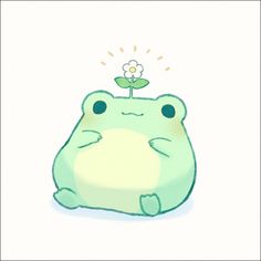 a green frog with a flower on top of it's head sitting in front of a white background