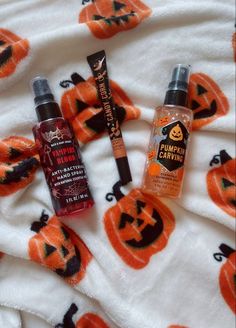 an assortment of halloween products on a blanket