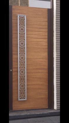 a wooden door with an intricate design on it