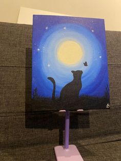 a painting of a cat sitting on top of a couch under a blue sky with stars