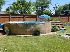 an above ground swimming pool in a backyard