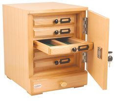 a wooden cabinet with drawers open on the inside