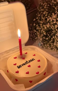 a small birthday cake with a candle in it