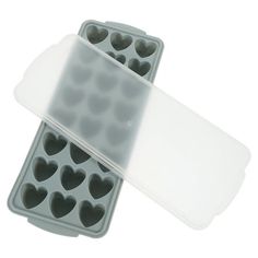 two heart shaped muffin pans are shown in the shape of an ice tray