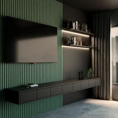 a living room with green walls and shelves on either side of the wall is a television