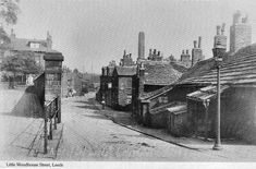 an old black and white photo of some buildings