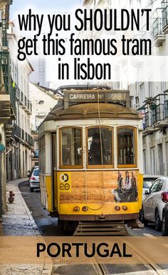 a yellow trolly car on the street with text overlay that reads, why you shouldn't get this famous tram in lisbon portugal