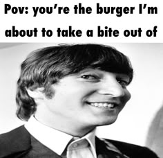 a black and white photo of a man in a suit with the caption pov you're the burger i'm about to take a bite out of