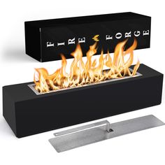 a black box with flames in it and a metal base on the bottom is shown