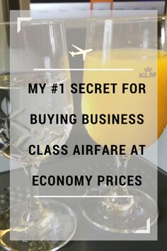 two wine glasses sitting on top of a table next to each other with the words, my 1 secret for buying business class airfare at economy prices