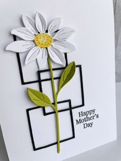 a card with a flower on it and the words happy mother's day written in white