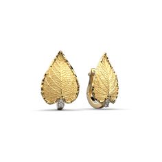 The made in Italy 14k or 18k gold latch back hoop earrings of the Flora collection have the shape of the ash leaf, a sacred tree in many cultures, a symbol of the sun and always used as a protection. Ideal earrings for everyday elegance, a new talisman that will bring you luck and a good mood. 14k or 18k gold Natural Diamonds 0,1 Cts G VS 20mm height 14mm large designed and crafted in Italy Italian Engagement Ring, Ash Leaf, Italian Gold Jewelry, Diamonds Earrings, Sacred Tree, Everyday Elegance, Italian Jewelry, Nature Jewelry, Gold Hoop Earrings