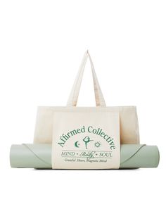 a yoga mat and bag sitting on top of each other, with the words affirmed collective printed on it