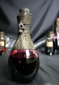 there is a bottle that has some wine in it