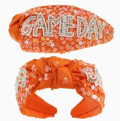 Enhance your game day look with our top knotted jeweled beaded headband. Made with high-quality materials, this headband adds a touch of sparkle to any outfit. Perfect for sports fans and fashion lovers alike. Stand out in the crowd and show your team spirit with this stylish accessory. HEIGHT: 6.5" WIDTH: 2.75" Headband Game, Football Headband, Orange Games, Beaded Headband, Turban Headbands, Turbans, Top Knot, Hair Accessories Headbands, Team Spirit