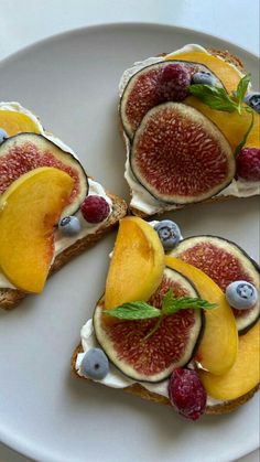 three pieces of bread with fruit on them