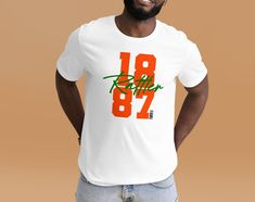 Strike in style with thee best college apparel for FAMU! This t-shirt is everything you've dreamed of and more. It feels soft and lightweight, with the right amount of stretch. It's comfortable and flattering for all.  Available in colors White, Grey, and Soft Cream. * Unisex Sized * 100% combed and ring-spun cotton (Heather colors contain polyester) * Fabric weight: 4.2 oz./yd.² (142 g/m²) * Pre-shrunk fabric * Side-seamed construction * Shoulder-to-shoulder taping Don't see your HBCU, message Famu Shirt, Branded Relaxed Fit T-shirt For College, College Athleisure T-shirt For Spring, College Outfits, Polyester Fabric, Fabric Weights, University, Florida, Gender Neutral