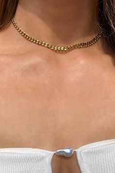 Cuban Choker gold, 18k gold necklace, Cuban Chain Choker, Cuban Link Necklace, Chain Choker, Pave Cuban Link Measurements: The necklace is 37cm long, including a 6cm extender chain.   🌊 100% waterproof, hypoallergenic and long lasting ✨ Our jewelry is crafted from high-quality stainless steel and plated with 18k gold. 💌 FREE WORLDWIDE SHIPPING Ready to ship in 1-3 business days How long until your jewelry arrives? 2-7 business days: EU 5-12 business days: US 7-14 business days: everywhere else Luxury Elegant Cuban Link Gold Necklace, Luxury Cuban Link Necklace With Figaro Chain For Everyday, Gold-tone 14k Gold Clavicle Chain Necklace, Dainty Gold Jewelry With Curb Chain, Yellow Gold Delicate Chain Cuban Link Necklace, Gold Chain Link Choker With Curb Chain, Gold Minimalist Necklace With Curb Chain, Minimalist Gold Necklace With Curb Chain, Gold Curb Chain Choker Jewelry