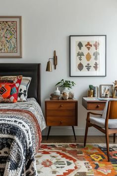 a bed room with a neatly made bed and two nightstands next to each other