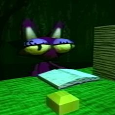 a cartoon character is sitting at a table with a book in front of him and an object to the side