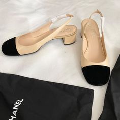 Chanel Interlocking Two Tone Black Beige Leather Slingback Pumps Heels Sz37.5 Us7 Low Hight 2.8 In Worn 2 Times ,Great Condition,Authentic With Serial Number,With Dust Bags Found 2 Areas Had Discolor From Storage ,Please Review Pictures Flat Toes With Grosgrain Trim With Sole Pads On Chanel Flat Sandals, Black Shoes Outfit, Chanel Slides, Chanel Heels, Chanel Flats, Chanel Women, Chanel Boots, Shoes Chanel, Classy Shoes