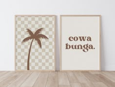 two framed posters with the words, cowa bunga and a palm tree on them