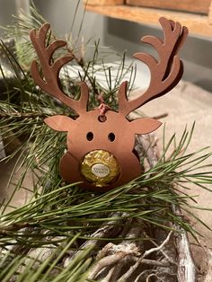 a christmas ornament with a deer's head on it