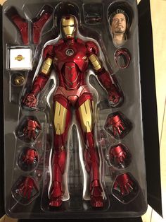 the iron man action figure is in its box and has many other items to choose from