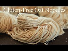 several skeins of yarn sitting on top of each other with the words gluten - free oat noodles