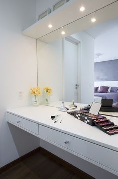 a bathroom with a sink and mirror in it