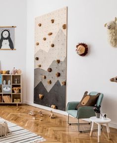 a child's bedroom with climbing walls and toys