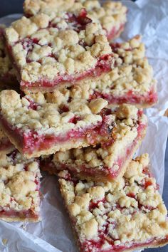 strawberry crumb bars stacked on top of each other