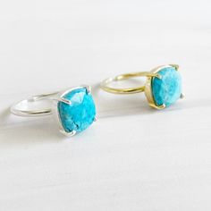 Classic and wearable, this stunning ring will definitely make a statement. Also available in other gemstones GEMSTONE: Turquoise STONE SIZE: 12mm x 12mm RING SIZE: Adjustable MATERIAL: gold/silver plated brass Gold Turquoise Ring With Large Stone As Gift, Turquoise Open Crystal Ring With Gemstone, Turquoise Open Crystal Ring, Gems Jewelry, Turquoise Gemstone, Turquoise Stone, Solitaire Ring, Gemstone Ring, Prong Setting