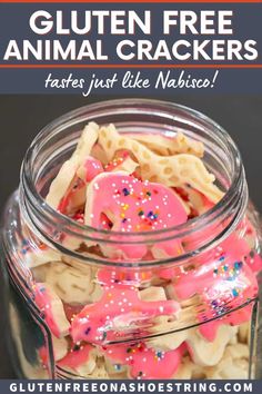 gluten free animal crackers in a glass jar with pink and white sprinkles