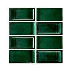 green glass tiles are arranged in the shape of rectangles on a white background