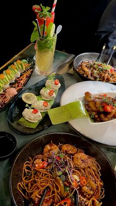 a table topped with lots of different types of food