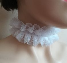 Ruffled lace collar, white lace ckoker.Handmade chic ruffled tulle collar. Organza ribbon ties  can be worn at the front or back of the neck detachable neck collar for women. approximate dimensions COLLAR:  wide 2" length 11- 12"  One size fits all.  adjustable with ribbon or please contact me for other sizes Please check your registered address on Etsy is up to date before purchasing  EXSPRESS SHİPPİNG:  need PHONE NUMBER Express shipping option available for countrys.You can see it when you buy and select your country We recommend you to send your phone number with a message in the fast cargo option. When the cargo does not find you on your adress. The product will not come back to me and it will be destroyed. The seller does not accept responsibility in this case The buyer is responsibl Clown Collar, Neck Ruffle Collar, White Lace Choker, Lace Fingerless Gloves, Ruff Collar, White Chic, Lace Choker, Pink Skin