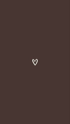 a white heart on a brown background