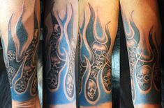 three different views of a man's arm with skulls and flames on it