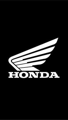 the honda logo on a black background with white wings and letters that read,'honda '