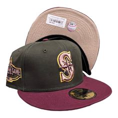 two new era hats, one in grey and the other in maroon are on display