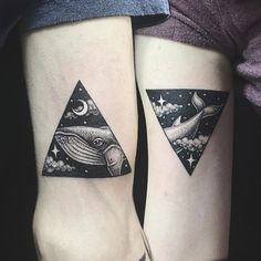 two people with matching tattoos on their arms, one has a whale and the other has a triangle