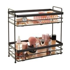 three tiered shelf with cosmetics and makeup products on it's sides, against a white background