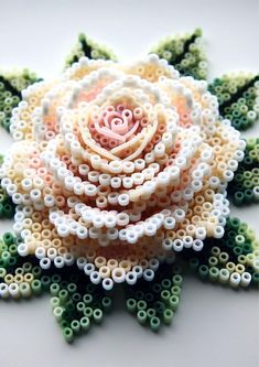 an intricately designed flower made out of beads