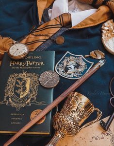 a harry potter book and some other items